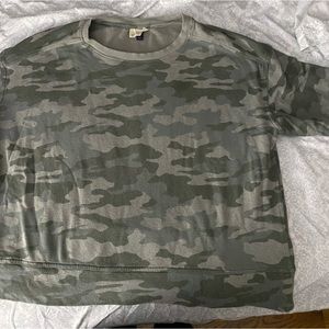 Adorable, camo crewneck. Short on length, but not cropped. Very flattering.
